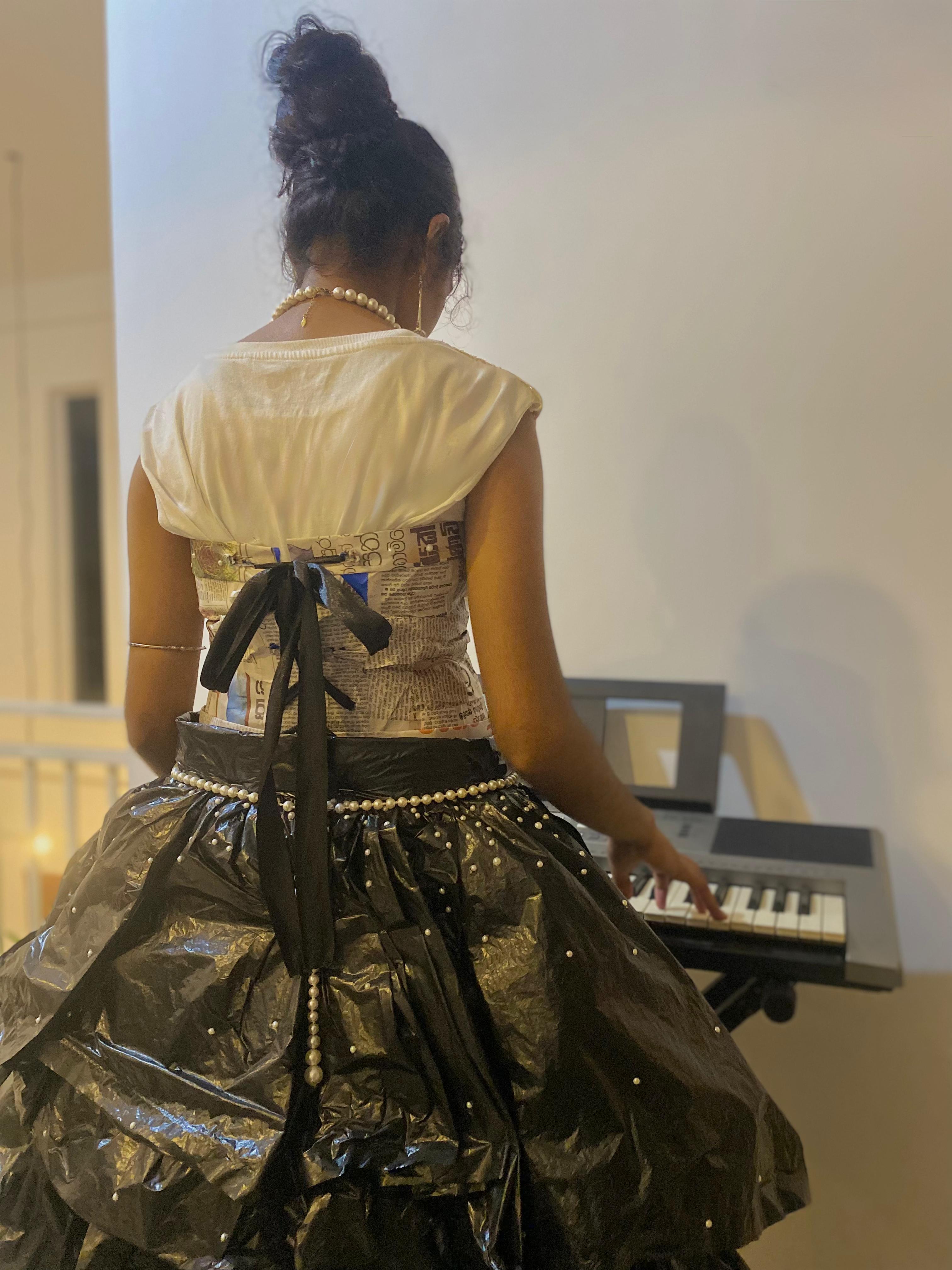 A girl playing the piano